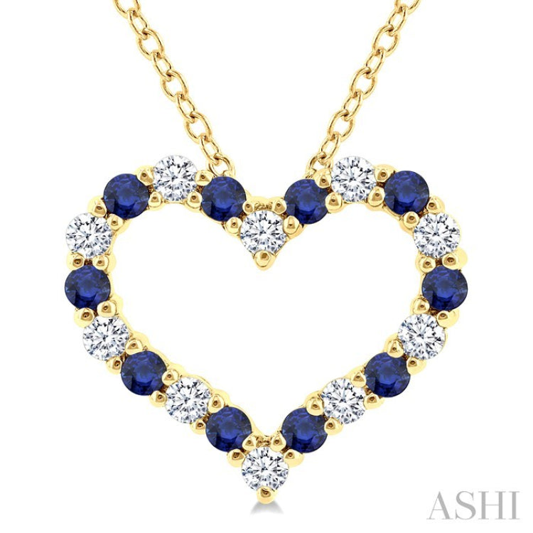 1.4 MM Round Cut Sapphire and 1/8 Ctw Open Heart Round Cut Diamond Precious Fashion Pendant With Chain in 14K Yellow Gold