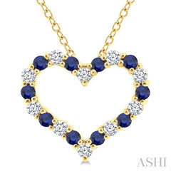 1.4 MM Round Cut Sapphire and 1/8 Ctw Open Heart Round Cut Diamond Precious Fashion Pendant With Chain in 14K Yellow Gold