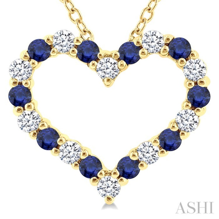 1.4 MM Round Cut Sapphire and 1/8 Ctw Open Heart Round Cut Diamond Precious Fashion Pendant With Chain in 14K Yellow Gold