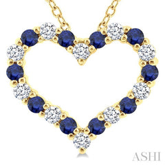 1.4 MM Round Cut Sapphire and 1/8 Ctw Open Heart Round Cut Diamond Precious Fashion Pendant With Chain in 14K Yellow Gold