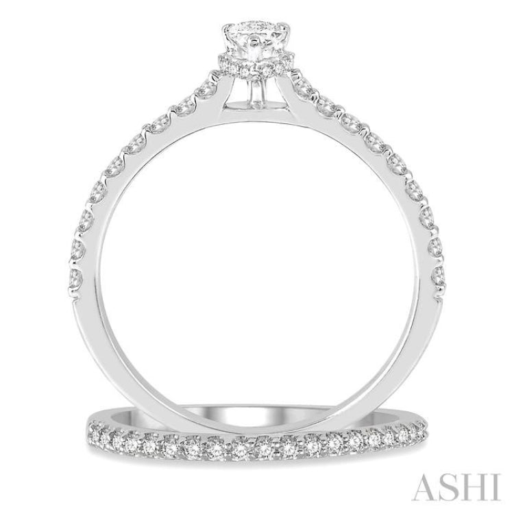 5/8 Ctw Round Cut Diamond Wedding Set With 1/2 Ct Pear Cut 1/4 Ct Center Stone Engagement Ring and 1/6 Ct Wedding Band in 14K White Gold