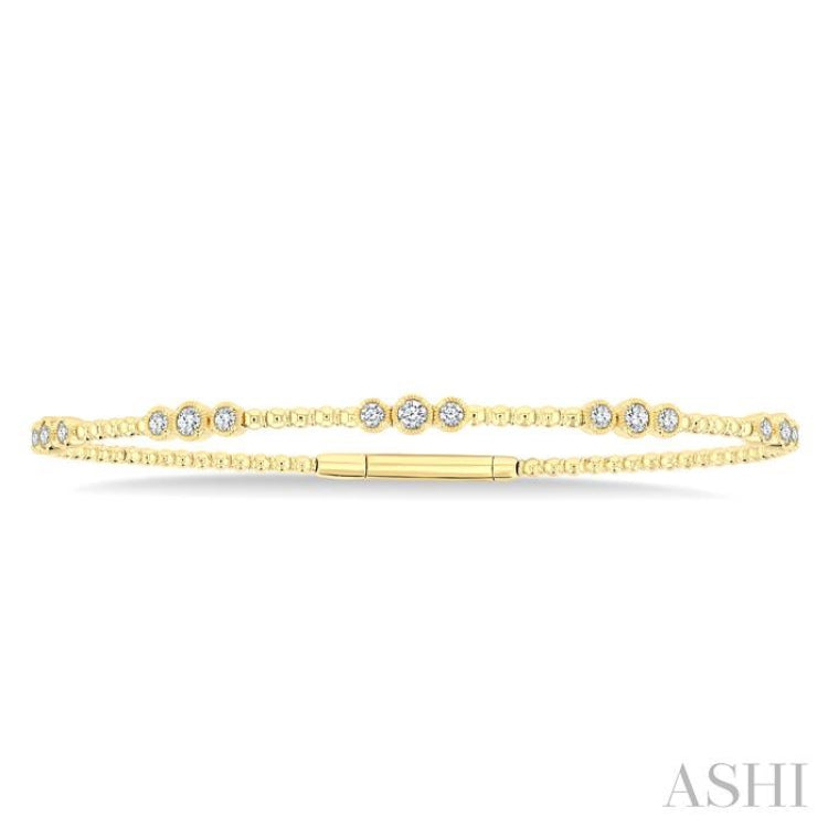 1/2 Ctw Three Stone Bezel Set Round Cut Diamond Flex Bangle in 14K Yellow Gold
