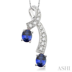 5x4 MM Oval Cut Sapphire and 1/6 Ctw Round Cut Diamond Precious Pendant in 14K White Gold with Chain