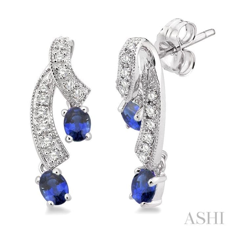4x3 MM Oval Cut Sapphire and 1/5 Ctw Round Cut Diamond Precious Earrings in 14K White Gold