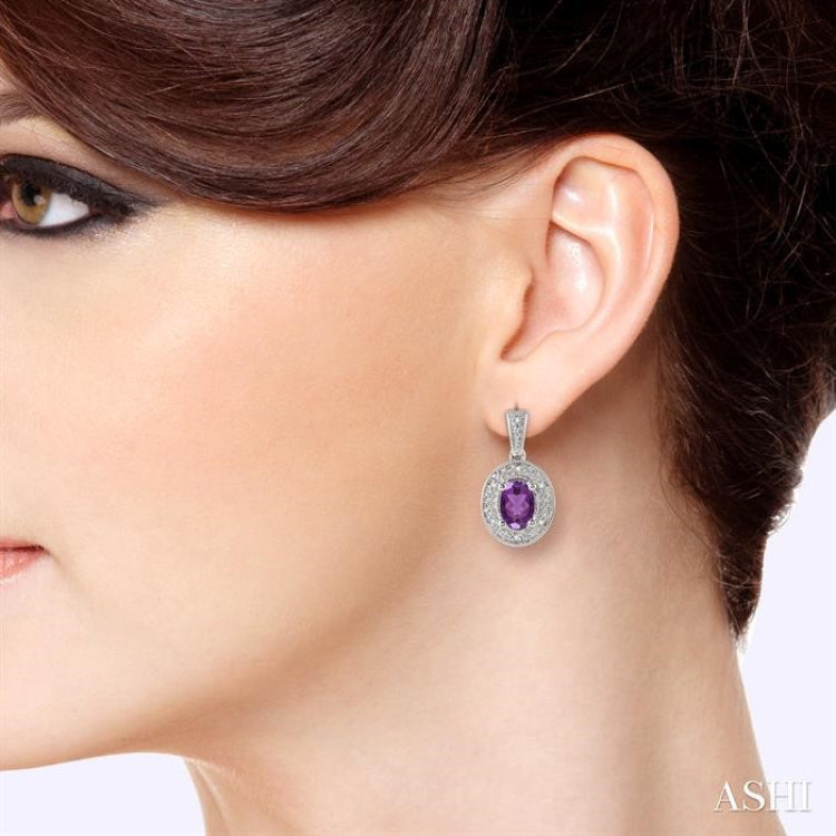 7x5 MM Oval Cut Amethyst and 1/20 Ctw Round Cut Diamond Earrings in Sterling Silver