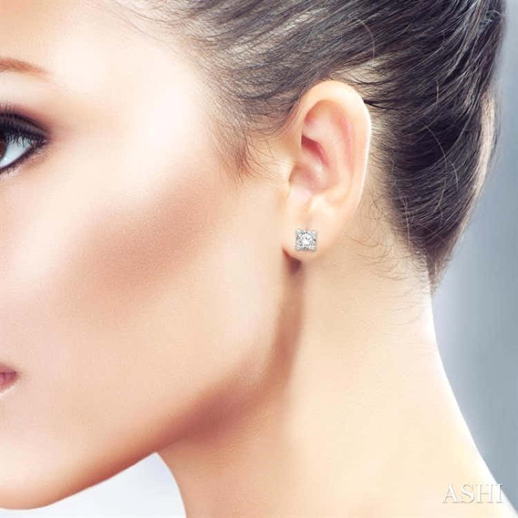 1/20 Ctw Round Cut Diamond Stud Earrings in 14K White Gold