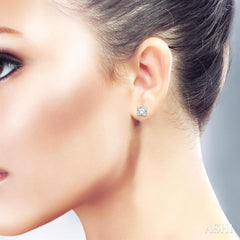1/20 Ctw Round Cut Diamond Stud Earrings in 14K White Gold